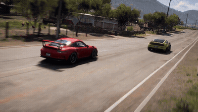Red Sports Car Driving Next To Yellow Car GIF