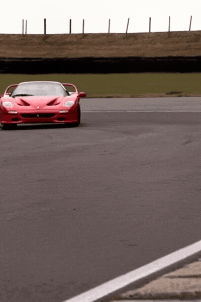 Red Sports Car Driving On Track GIF