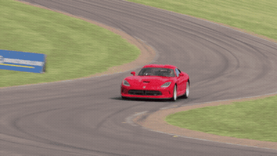 Red Sports Car Driving On Track GIF