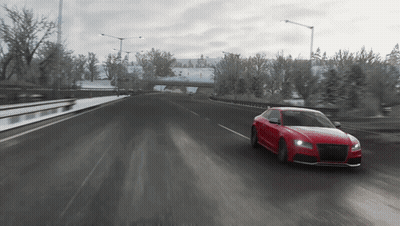 Red Sports Car With Black Hood Driving GIF
