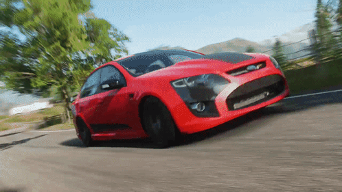 Red Sports Car With Black Hood Driving GIF