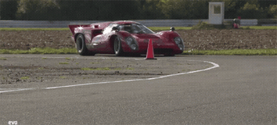 Red Sports Car With Pia On Windshield GIF