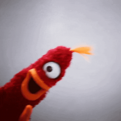 Red Stuffed Animal Big Eyes Orange Tail GIF