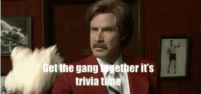 Red Suit Man Holding Dog Saying Trivia Time GIF