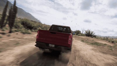 Red Truck Driving On Dirt Road GIF