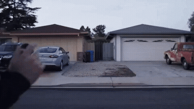 Red Truck Parked In Front Of Garage GIF