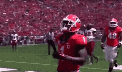 Red Uniform Football Player Running With Ball GIF