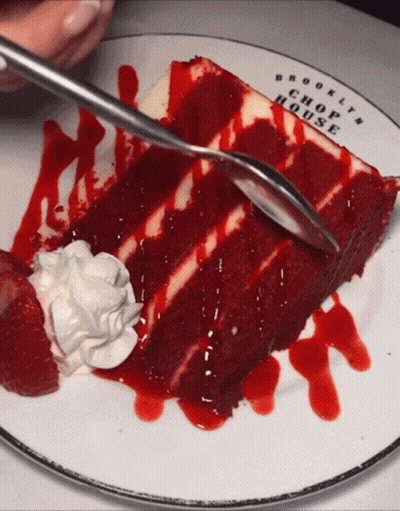 Red Velvet Cake Slice On Brooklyn Chop House Plate GIF