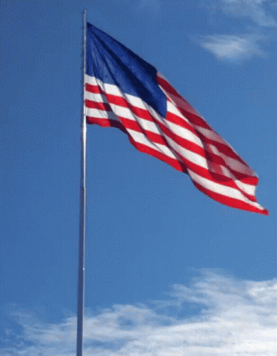 Red White And Blue American Flag Flying In Wind GIF