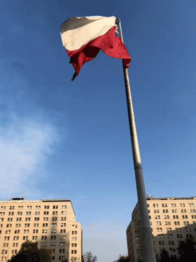Red White And Blue Flag Flies In Wind GIF