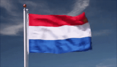 Red White And Blue Flag Waving In The Wind GIF