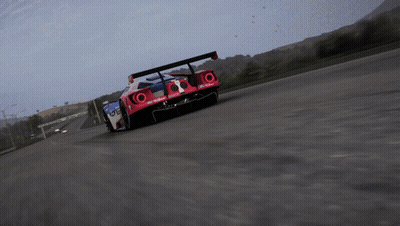 Red White And Blue Race Car Number 66 GIF