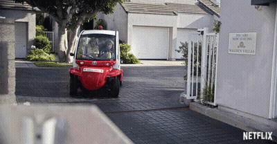 Red White Vehicle Passing Walden Villas Leasing Sign GIF