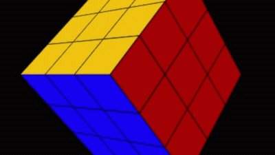 Red Yellow Blue Rubik's Cube Black Backdrop GIF