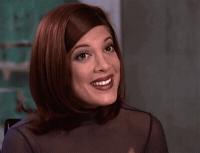Redhaired Woman Smiling Wearing Ring GIF