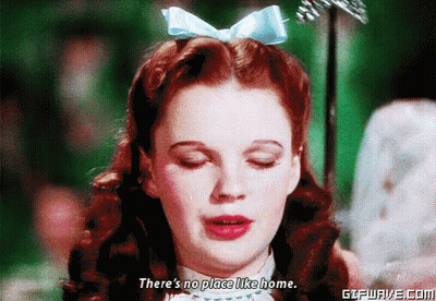 Redhead Blue Bow Says No Place Like Home GIF