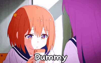 Redhead Girl Holding Cell Phone Saying Dummy GIF