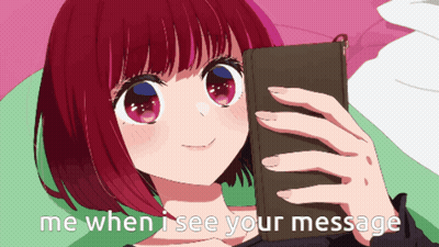 Redhead Girl Smiling At Phone GIF