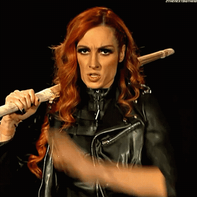Redhead Holding Stick Over Shoulder Funny Face GIF