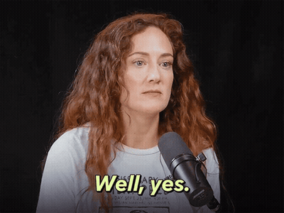 Redhead Woman At Microphone Saying Well Yes GIF