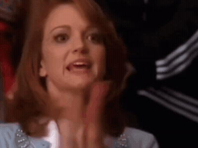 Redhead Woman Clapping And Making Funny Face GIF