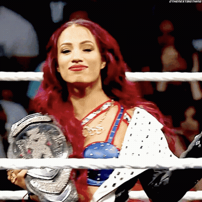 Redhead Woman Holding Wrestling Championship GIF