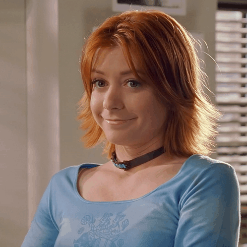 Redhead Woman In Blue Shirt And Choker GIF
