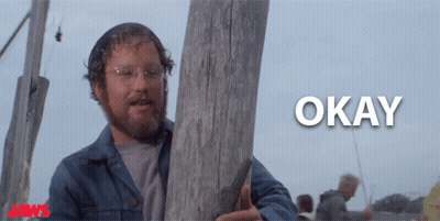 Redhead Woman In McDonald's Costume Standing In Front Of Tree GIF
