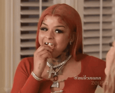 Redhead Woman In Red Top With Diamond Necklace GIF