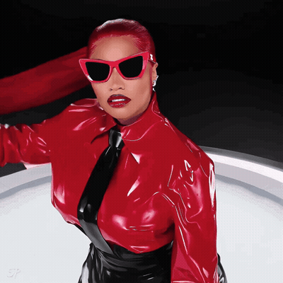 Redhead Woman In Sunglasses And Red Tie GIF