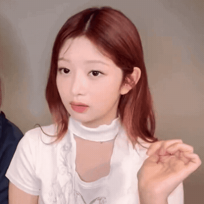 Redhead Woman In White Shirt And Choker GIF
