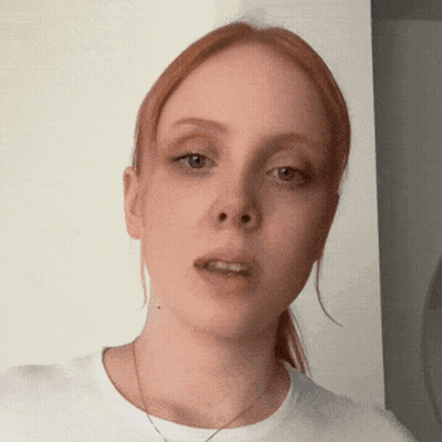 Redhead Woman In White T-Shirt GIF