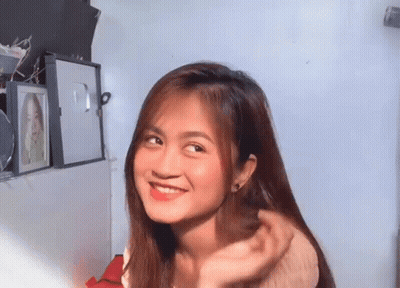 Redhead Woman Looking At Phone GIF
