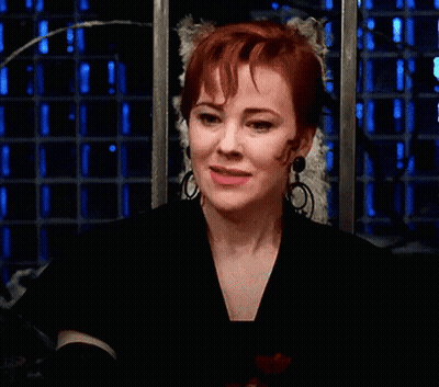 Redhead Woman Making Funny Face Saying Day-O GIF