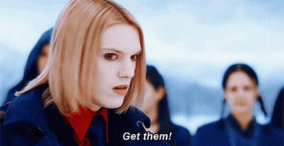 Redhead Woman Says Get Them GIF