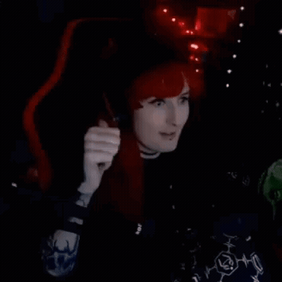 Redhead Woman Sitting Making OK Sign GIF