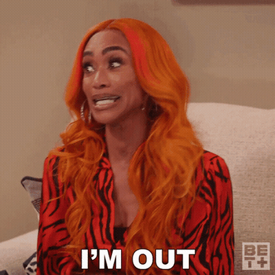 Redhead Woman Sitting On Couch Says I'm Out GIF