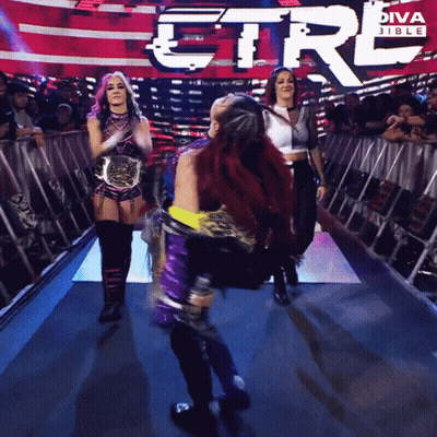 Redhead Woman Standing Before Diva Bible Logo GIF