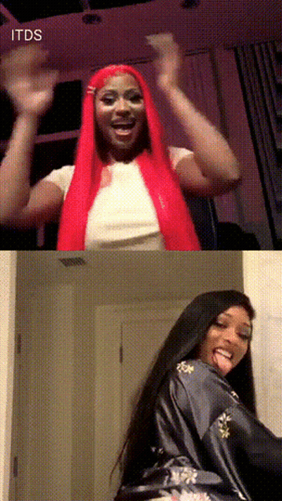 Redhead Woman Standing Next To Black-Haired Woman GIF