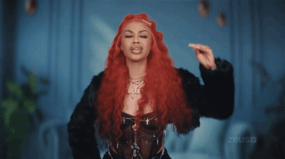 Redhead Woman Wearing Bride Necklace GIF