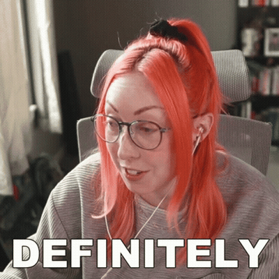Redhead Woman With Glasses And Headphones Saying Definitely GIF