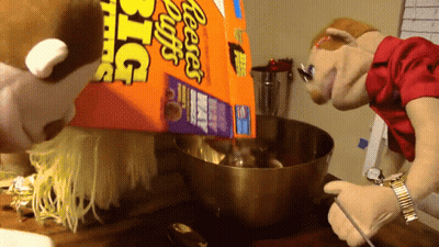 Reese's Puffs Poured Into Mixing Bowl GIF