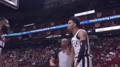 Referee Between Basketball Players GIF
