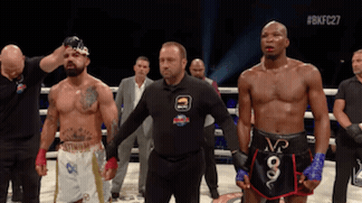 Referee Between Two Boxers In Ring GIF