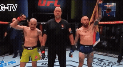 Referee Between Two Boxers In UFC Ring GIF