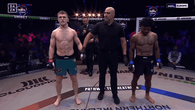 Referee Between Two Fighters In Boxing Ring With Northern Ireland GIF