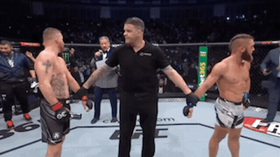 Referee Between Two Men In Boxing Ring GIF