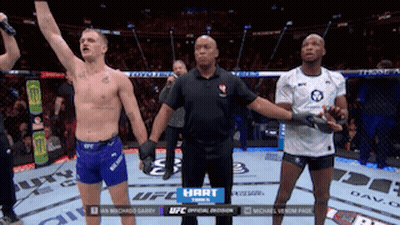 Referee Between Two UFC Fighters GIF
