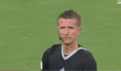 Referee Blowing Yellow Whistle At Soccer Player GIF