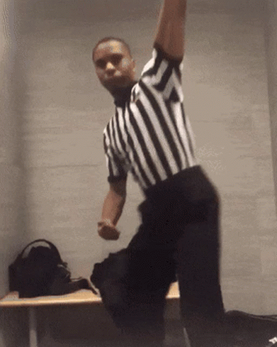 Referee Dancing In Black And White GIF